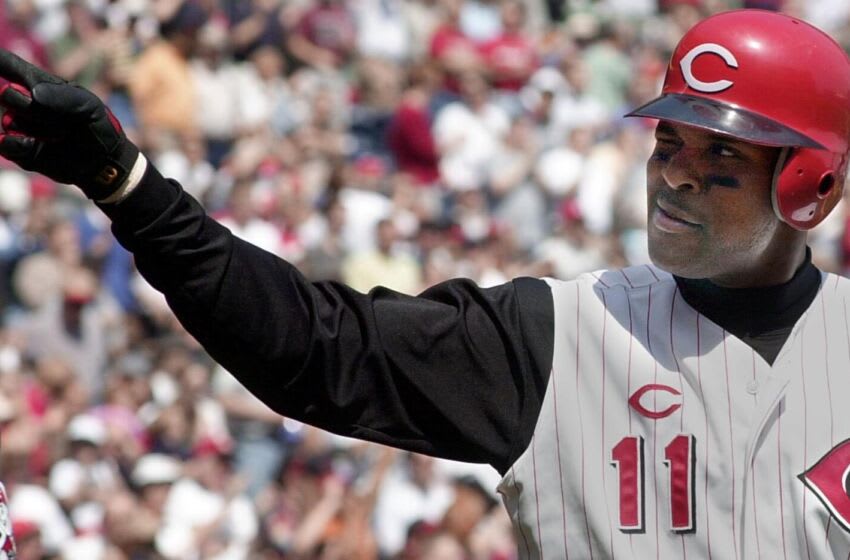 Cincinnati Reds' Barry Larkin points to the stands after scoring on a three-run single by Dmitri Young against the Pittsburgh Pirates's 05 April 2001 in Cincinnati. The Reds beat the Pirates 4-. AFP PHOTO/Mike SIMONS (Photo by MIKE SIMONS and - / AFP) (Photo by MIKE SIMONS/AFP via Getty Images)