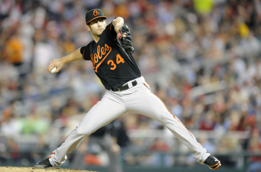 WASHINGTON, DC - MAY 18: Jake Arrieta #34 of the Baltimore Orioles pitches during a baseball game against the Washington Nationals at Nationals Park on May 18, 2012 in Washington, DC. The Orioles won 2-1 in eleven innings. (Photo by Mitchell Layton/Getty Images)