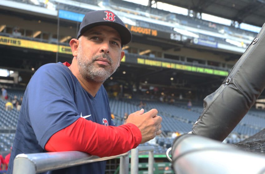 Aug 16, 2022; Pittsburgh, Pennsylvania, USA; Boston Red Sox manager Alex Cora (13) looks on at the batting cage before the game against the Pittsburgh Pirates at PNC Park. Mandatory Credit: Charles LeClaire-USA TODAY Sports