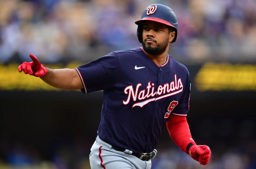 May 31, 2023; Los Angeles, California, USA; Washington Nationals third baseman Jeimer Candelario (9) reacts after hitting a two run home run against the Los Angeles Dodgers during the fifth inning at Dodger Stadium. Mandatory Credit: Gary A. Vasquez-USA TODAY Sports