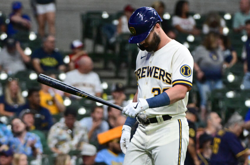 Jun 19, 2023; Milwaukee, Wisconsin, USA; Milwaukee Brewers designated hitter Jesse Winker (33) walks back to the dugout after striking out in the sixth inning against the Arizona Diamondbacks at American Family Field. Mandatory Credit: Benny Sieu-USA TODAY Sports