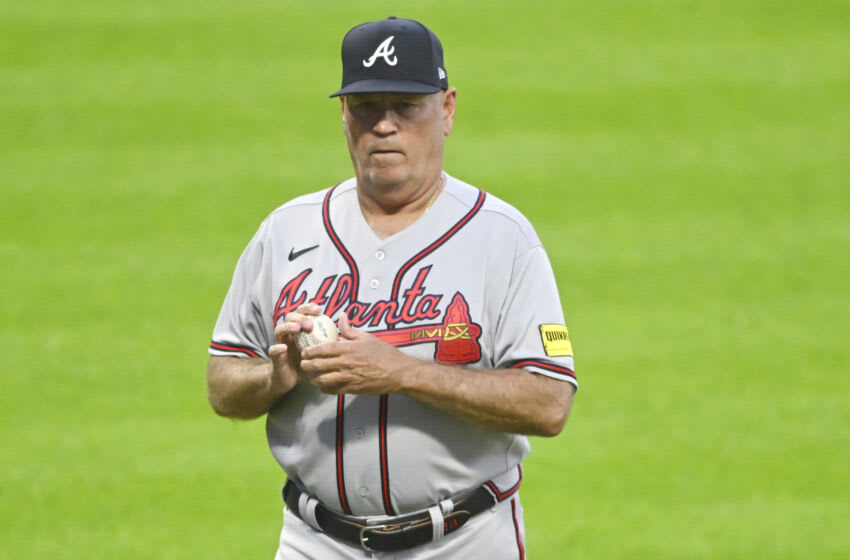 Jul 5, 2023; Cleveland, Ohio, USA; Atlanta Braves manager Brian Snitker (43) walks on the field in the fifth inning against the Cleveland Guardians at Progressive Field. Mandatory Credit: David Richard-USA TODAY Sports