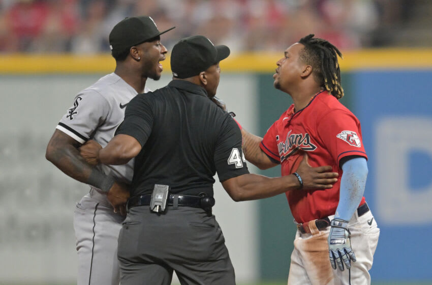 Aug 5, 2023; Cleveland, Ohio, USA; Umpire Malachi Moore tries to separate Cleveland Guardians third baseman Jose Ramirez (11) and Chicago White Sox shortstop Tim Anderson (7) after Ramirez slid into second with an RBI double during the sixth inning at Progressive Field. Mandatory Credit: Ken Blaze-USA TODAY Sports
